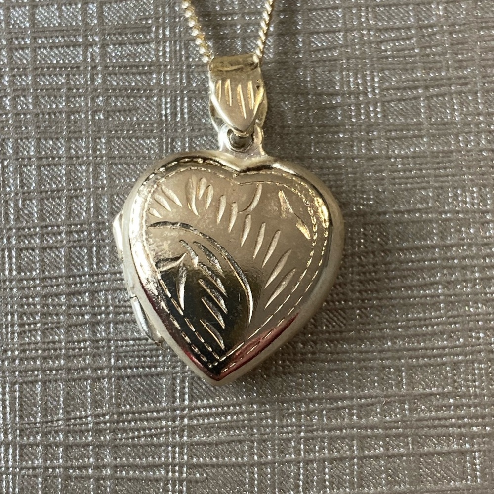 Silver chain with heart locket